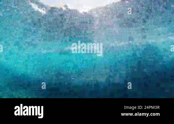 Dramatic underwater view of ocean waves breaking in the Maldives Stock ...