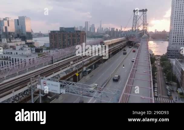 Aerial view of the subway crossing The Williamsburg Bridge. Shot on a ...