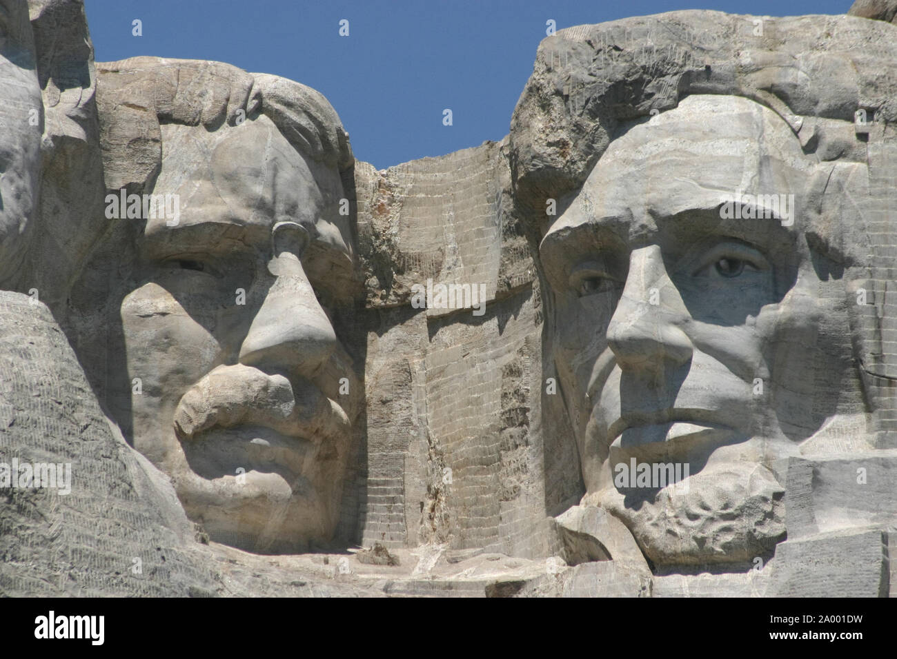 Presidents Theodore Roosevelt and Abraham Lincoln's stone faces on Mount Rushmore in South Dakota's Black Hills. Stock Photo