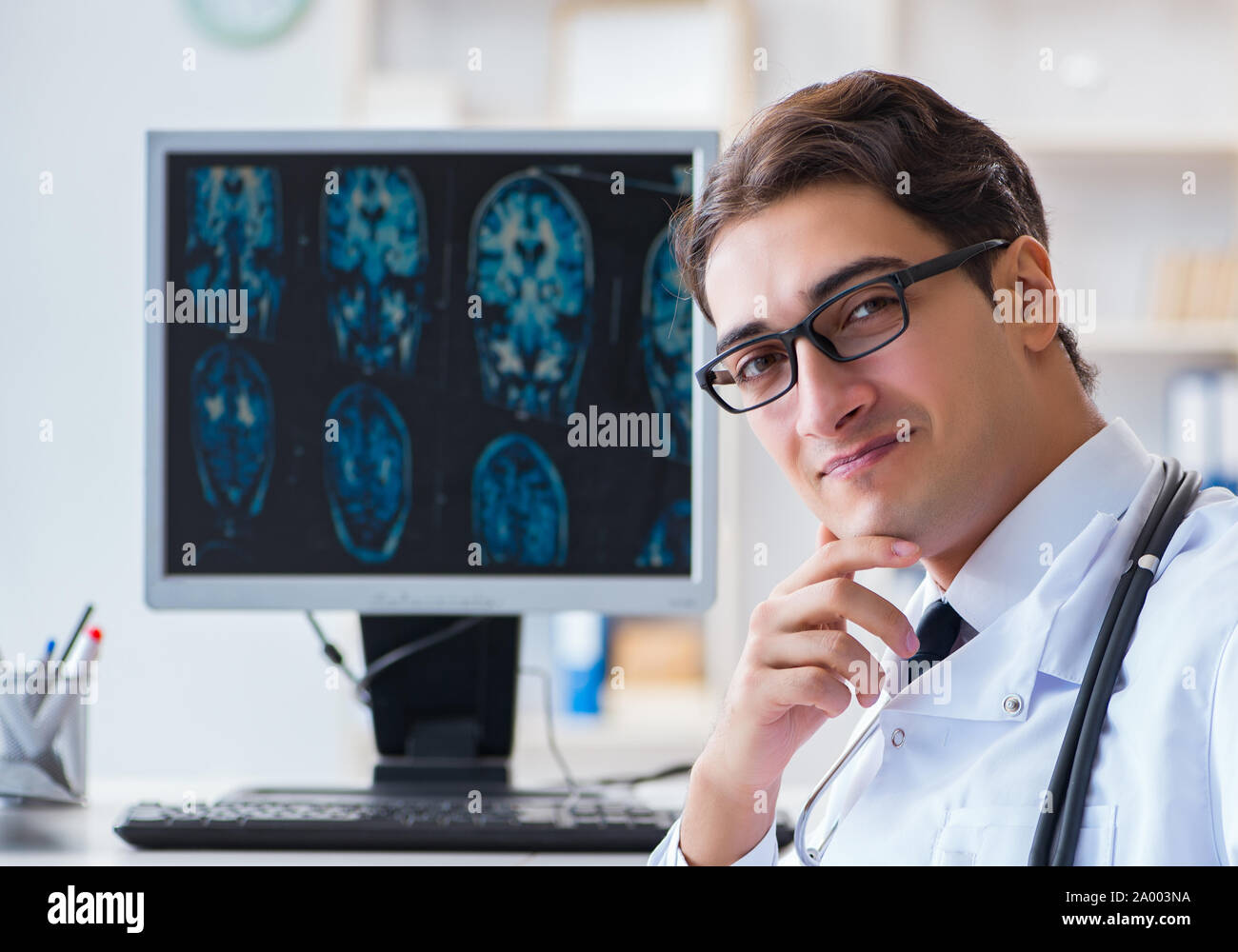 The doctor radiologist looking at x-ray images Stock Photo - Alamy