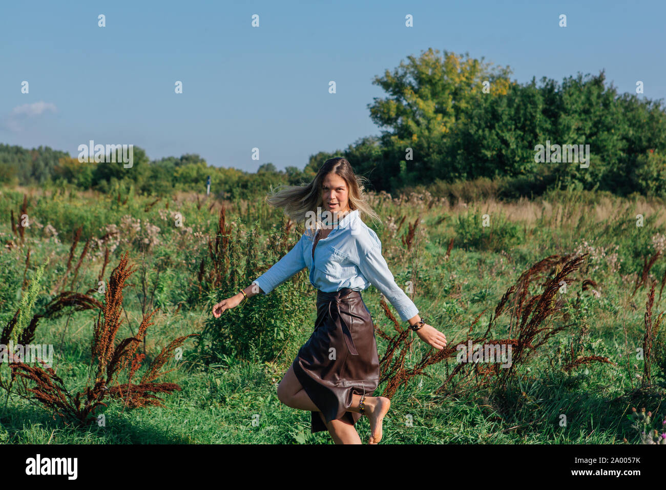 Boho woman walking away hi-res stock photography and images - Alamy