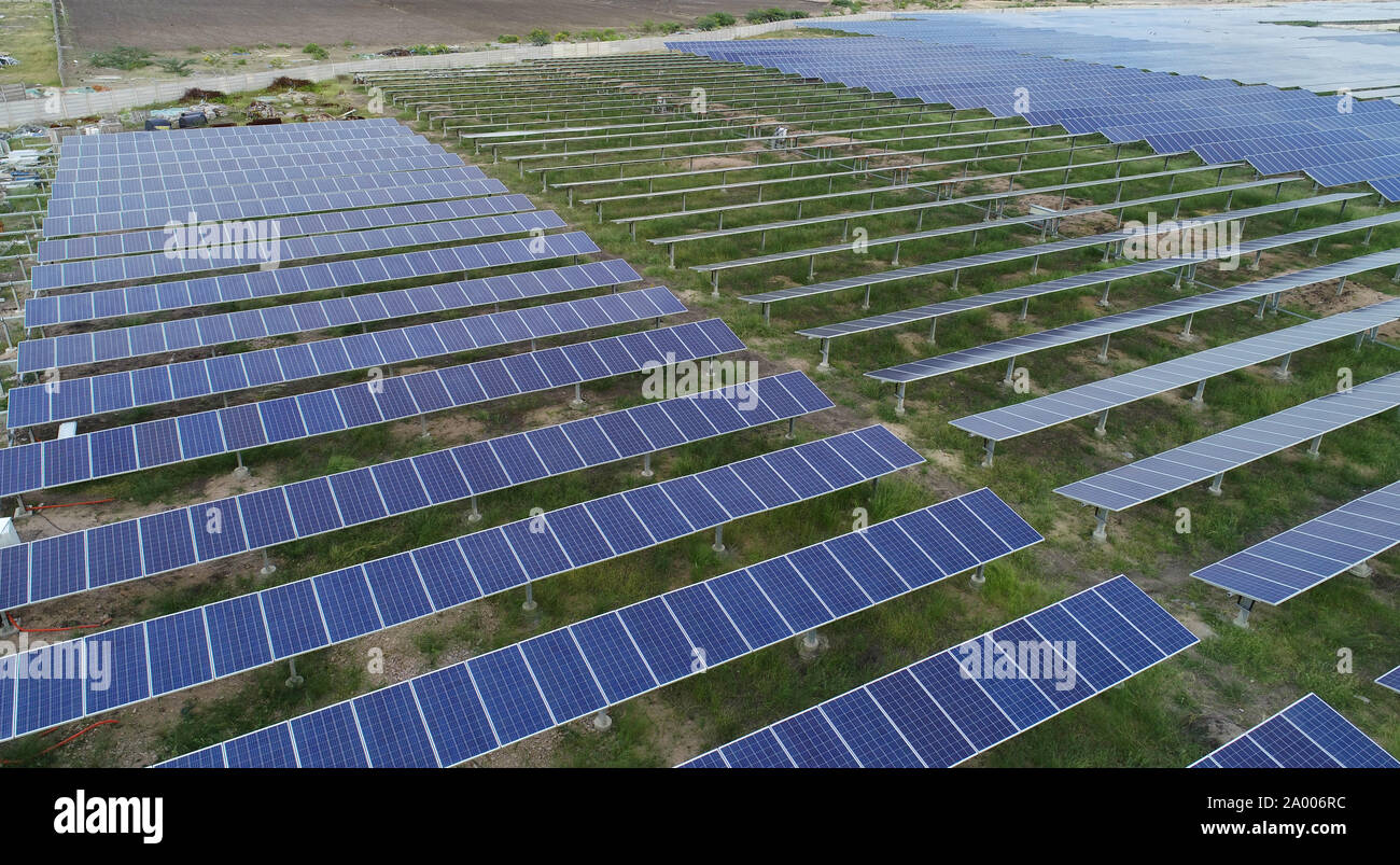 Aerial View of solar farm or solar power plant near Raichur, India. Stock Photo