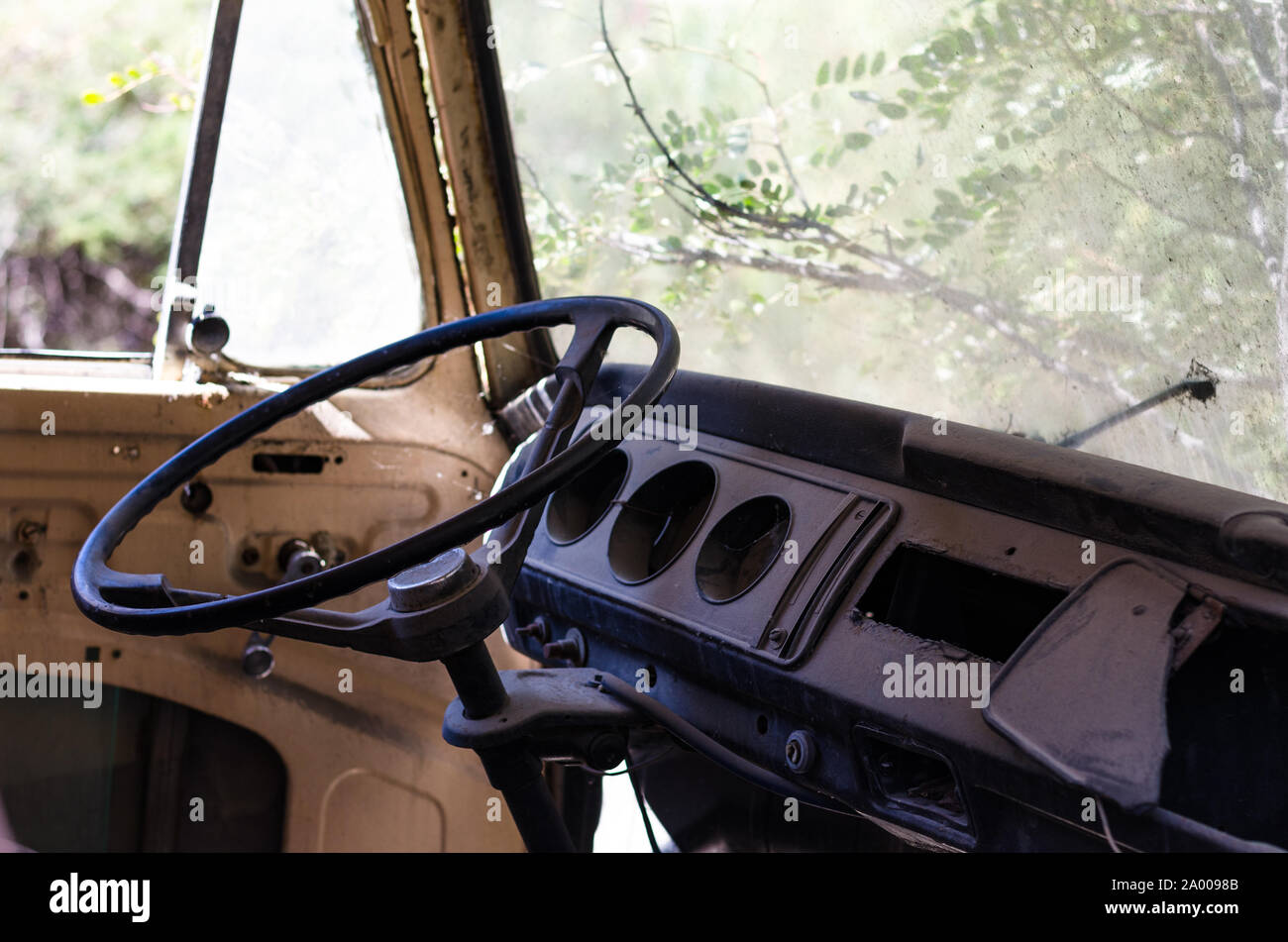 Old car equipment. old Internal equipment. Old cars that are not available. Inside there are spider webs and dust. Stock Photo