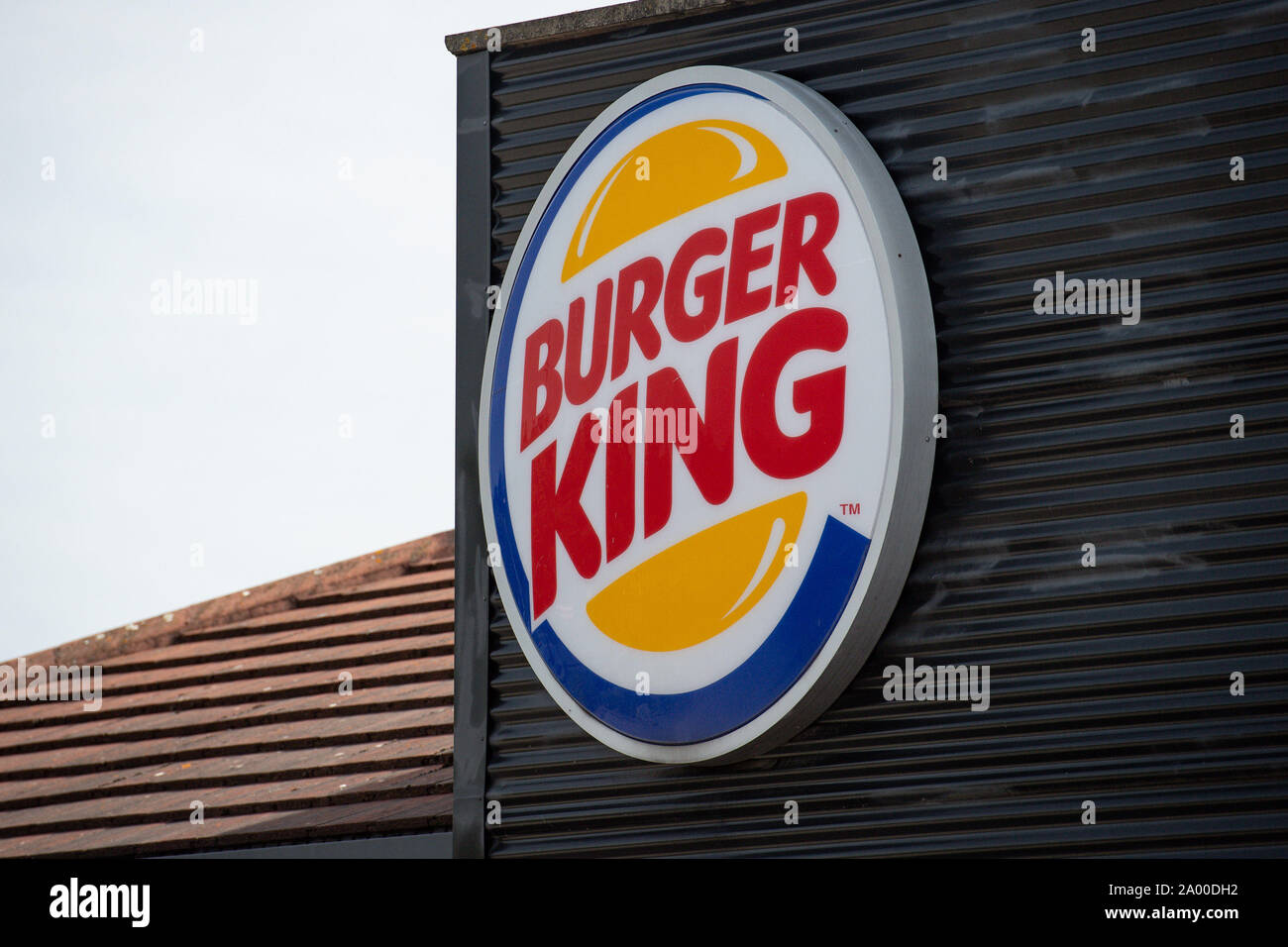 A sign for a Burger King drive thru restaurant. The fast food chain has announced that they are removing all plastic toys from its children's meals served in the UK from Thursday to save an estimated 320 tonnes of waste annually. Stock Photo