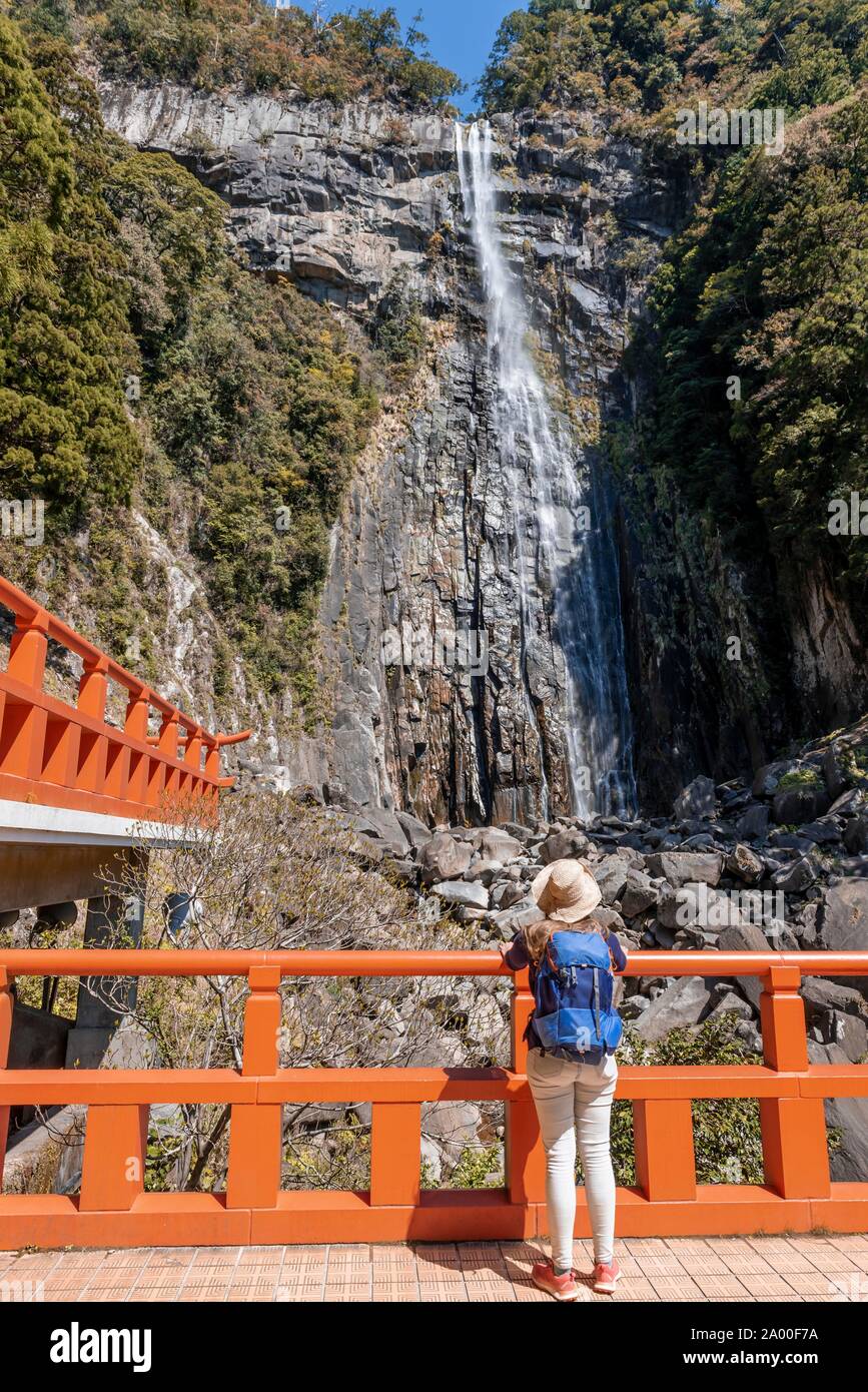 Tourist looks at Nachi Waterfall at Seigantoji Temple, Nachisan, Wakayama, Japan Stock Photo