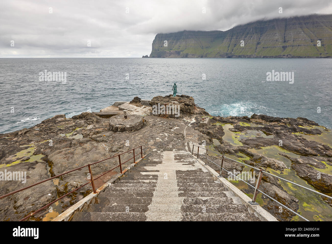 Faroe islands fjord coastline landscape in Kalsoy island. Mikladalur mermaid Stock Photo