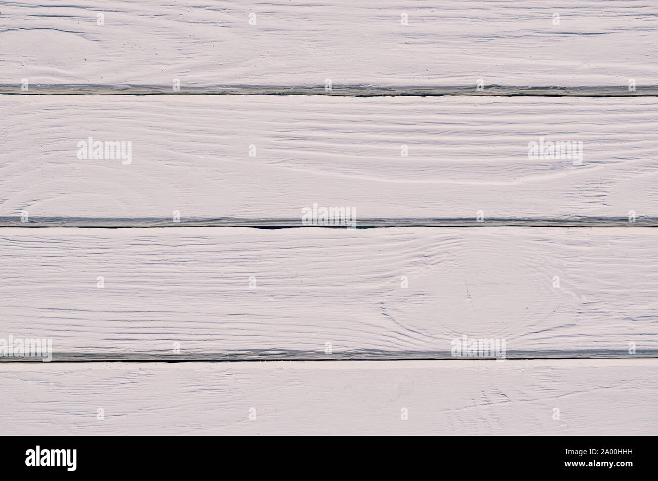 Wooden background texture. Creatively painted intense white boards. Stock Photo