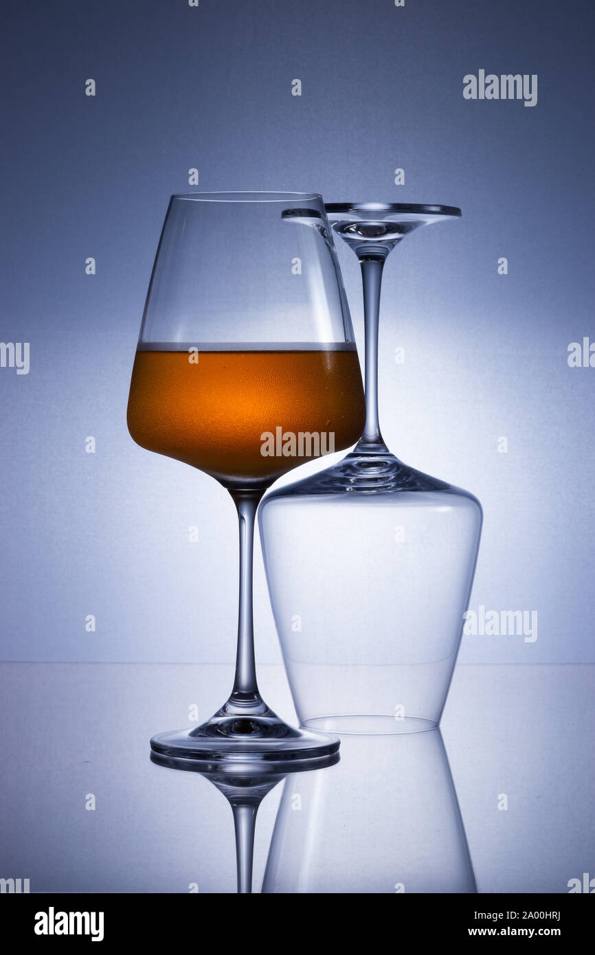 Wine glass on a reflective surface Stock Photo