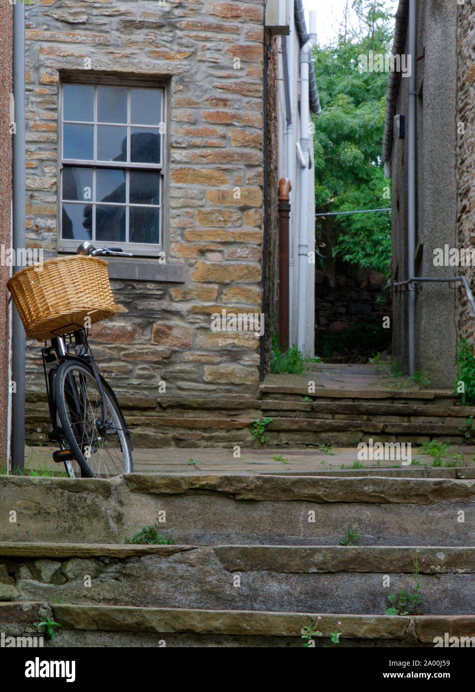 Stromness lane with traditional bicycle, Orkney Stock Photo