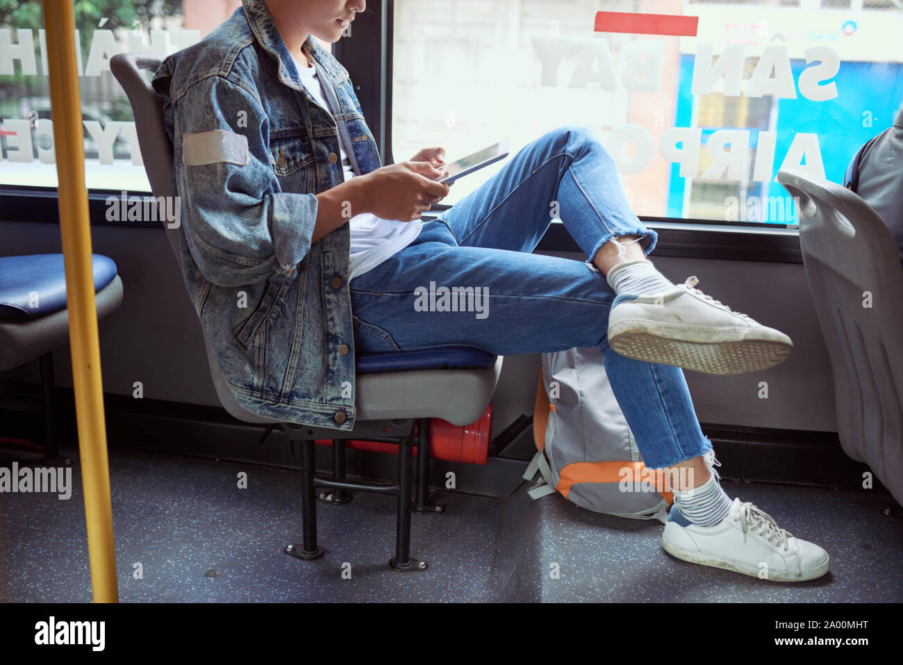 Transport. People in the bus. He reading book in transport. Stock Photo