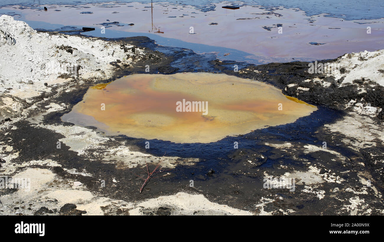 Contamination soil and water spot oil pollutions, former dump toxic waste,  environmental disaster, contamination of the environment, oil lagoon Stock  Photo - Alamy