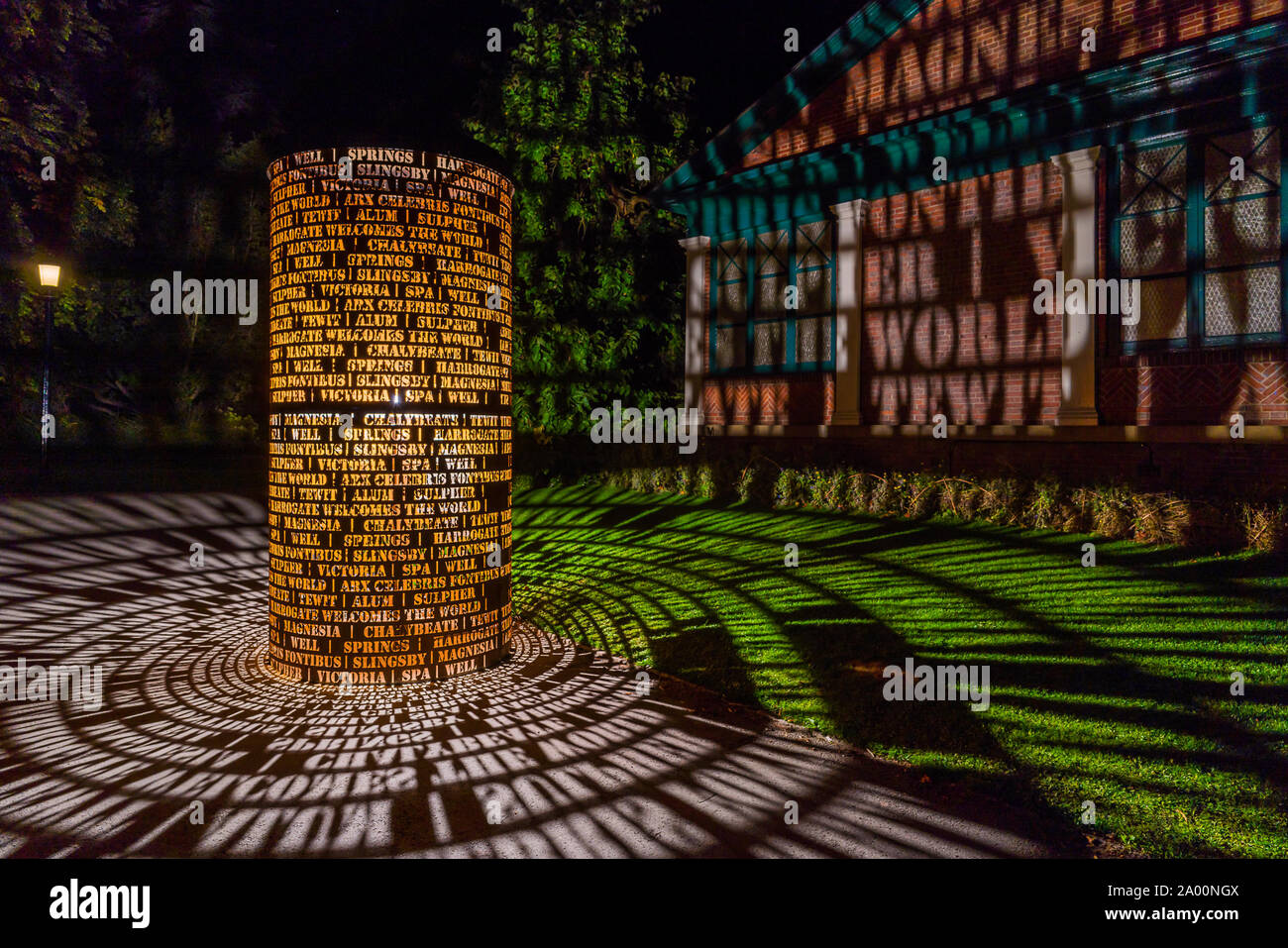 Valley Gardens, Harrogate, United Kingdom. 18th September, 2019. Eddie Roberts' sculpture is lit up overnight in the Valley Gardens, celebrating the heritage of the town and welcomes the world as the UCI World Championships take place between 21 to 29 September 2019 in and around Harrogate North Yorkshire, UK. Credit: Caught Light Photography/Alamy Live News. Stock Photo