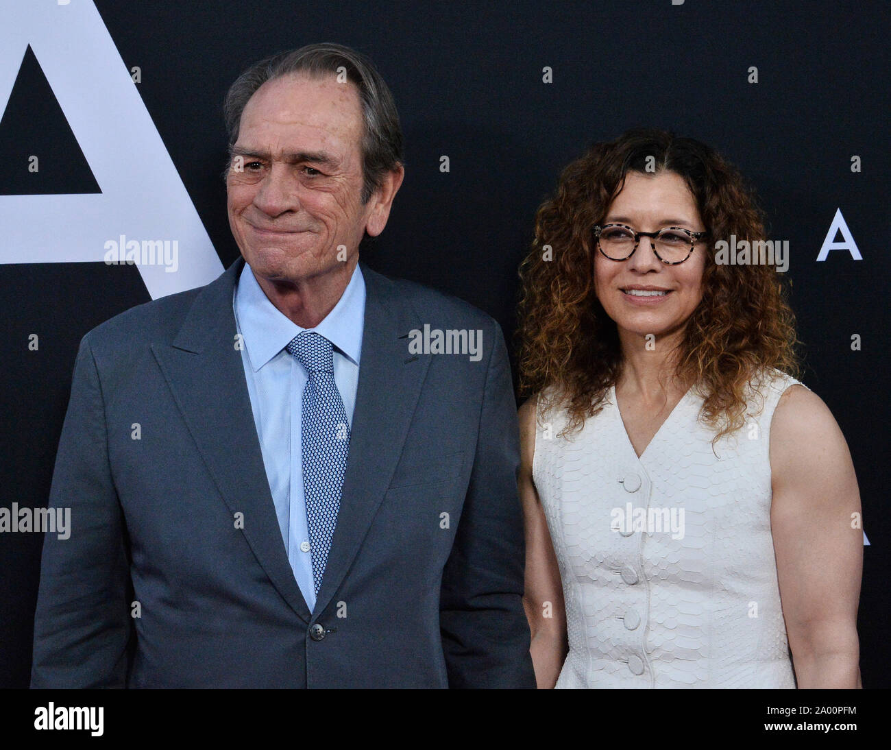 Cast member Tommy Lee Jones and his wife Dawn Laurel-Jones attend the  premiere of the motion picture sci-fi thriller "Ad Astra" at the ArcLight  Cinerama Dome in the Hollywood section of Los