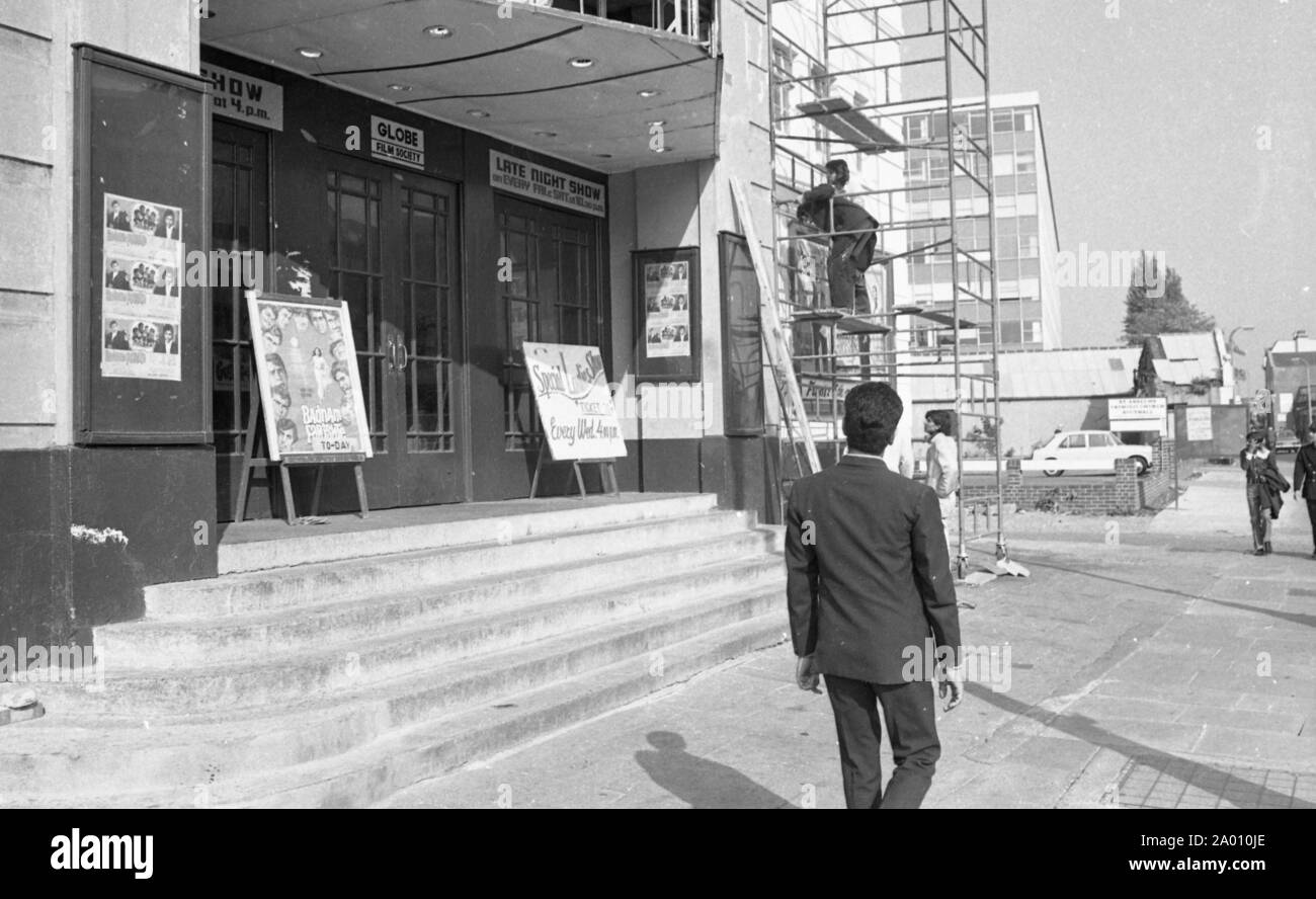 Southall, London 1972. The local cinema showing Indian movies. After Idi Amin ordered 30,000 Asians out of Uganda with 90 days notice, those with British Passports headed to England. They were forced to leave their money, property and possessions behind. These images document life for some of the people as they settled in Southall, west of London. An insight into life 47 years ago for immigrants in the UK. Photo by Tony Henshaw Stock Photo