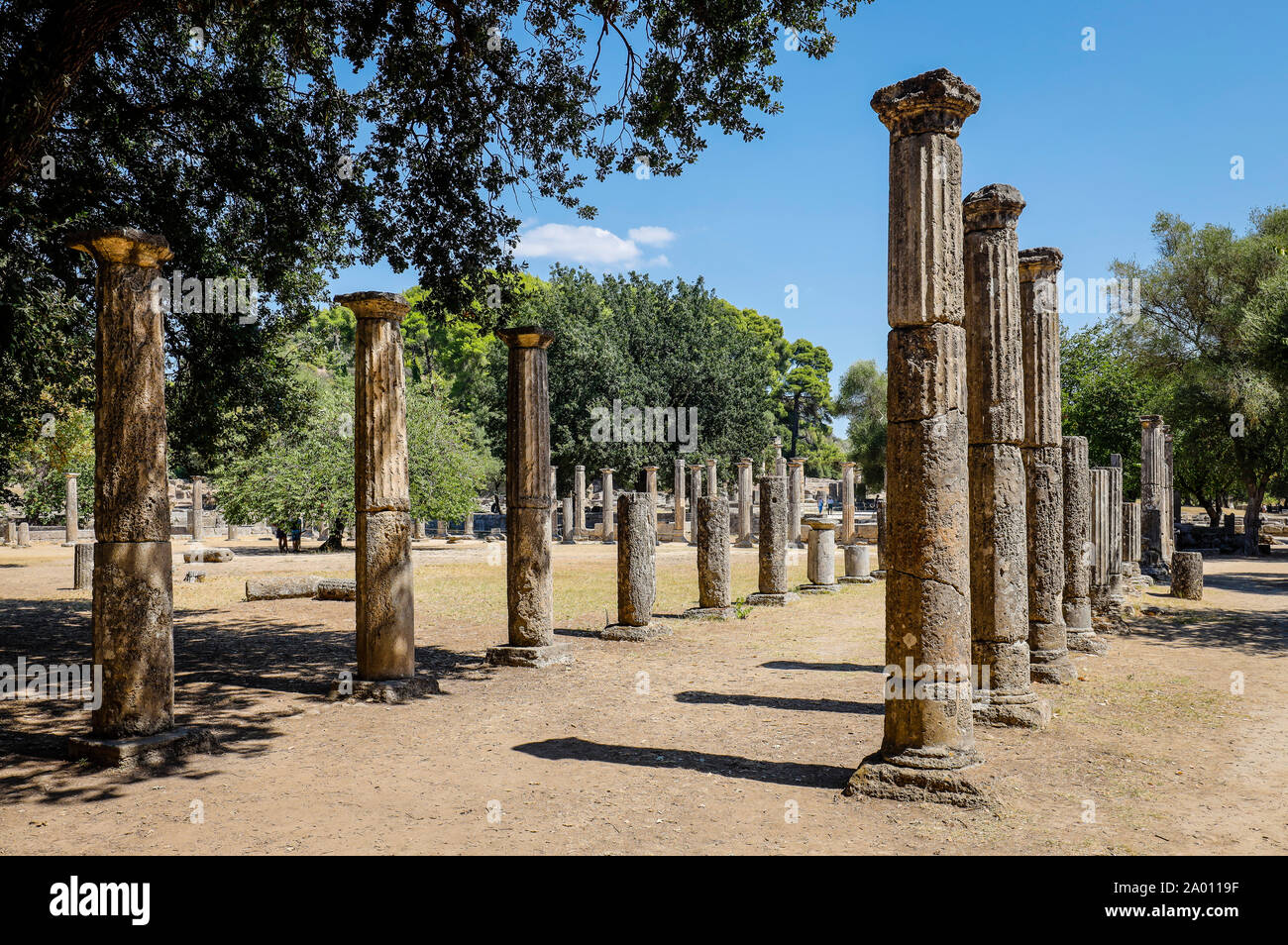 Olympia, Elis, Peloponnese, Greece - Ancient Olympia, here colonnades with Doric columns of the wrestling school Palaestra.  Olympia, Elis, Peloponnes Stock Photo
