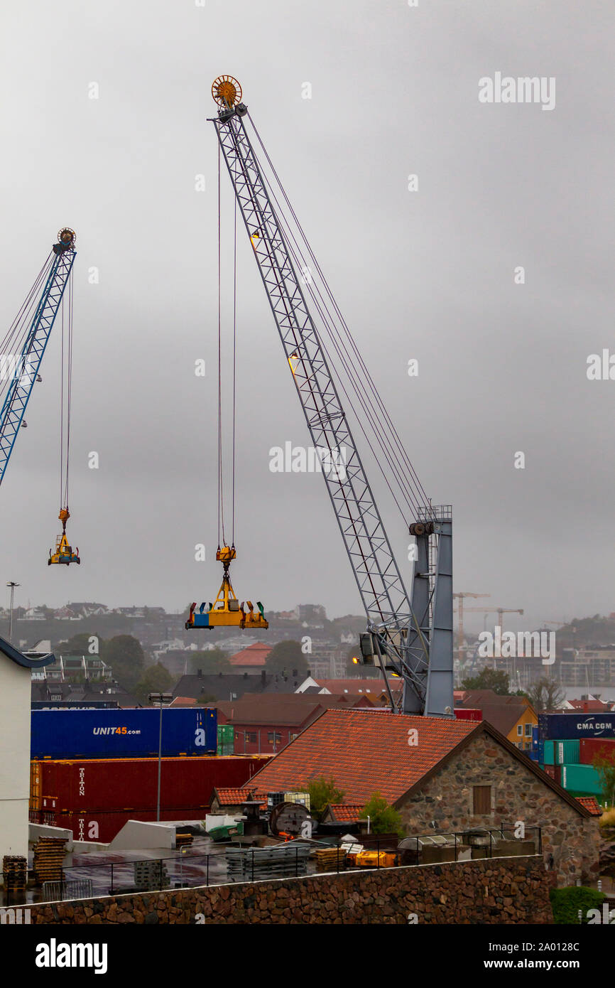 Dock side cranes for lifting containers, Kristiansand, Norway. Stock Photo