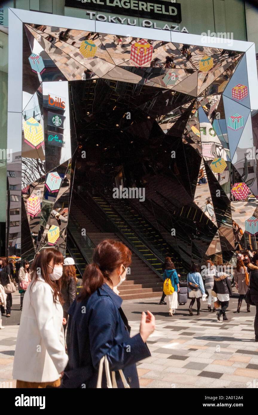 Tokyo Plaza mirrored entrance escalator, Japan. Stock Photo