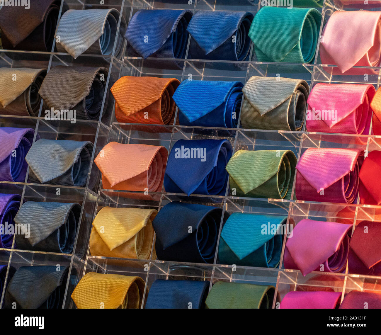 different colors silk tie on display stand Stock Photo