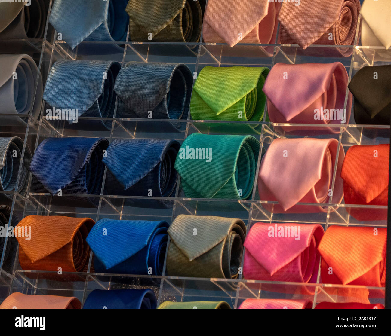 different colors silk tie on display stand Stock Photo Alamy