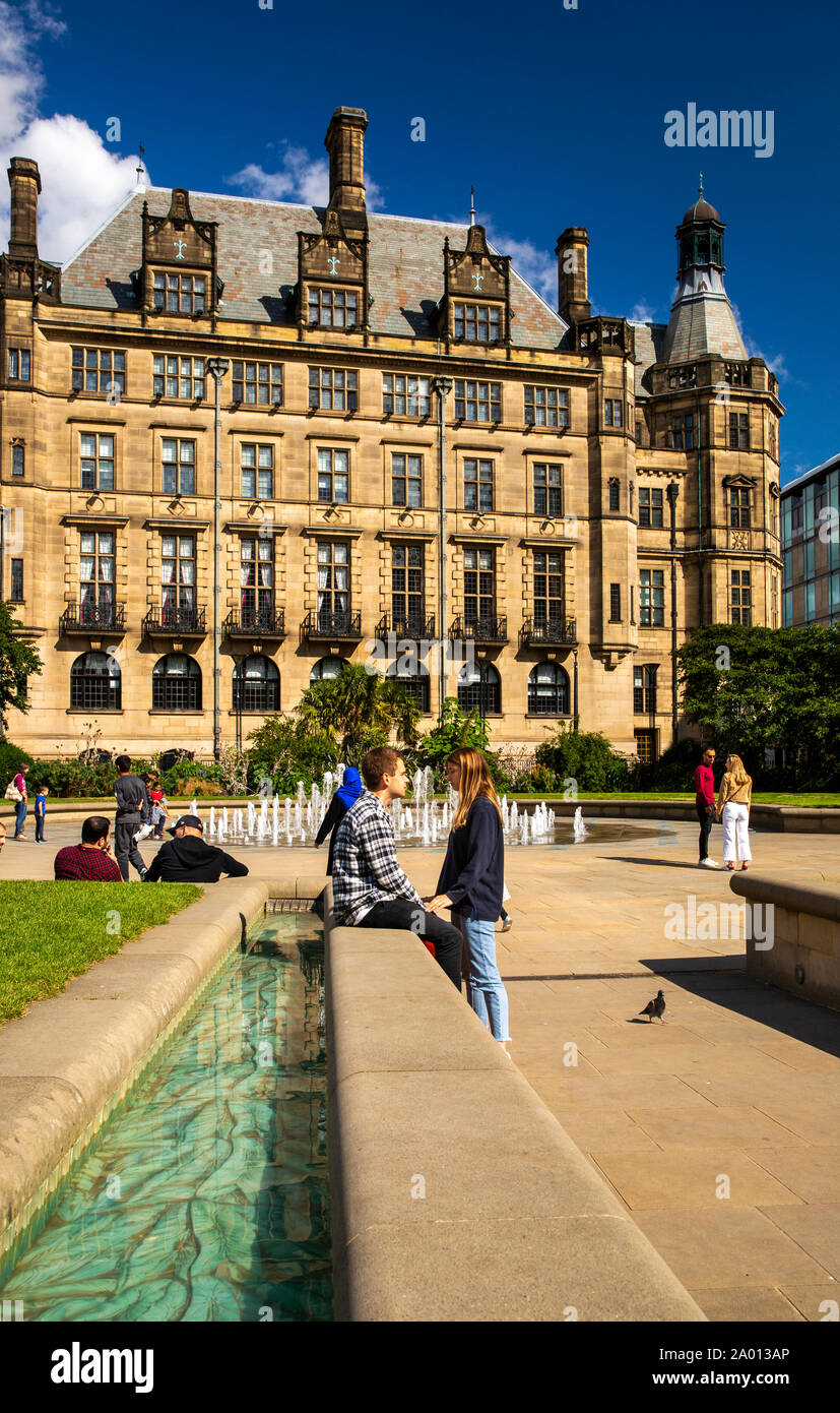 UK, Yorkshire, Sheffield, Peace Gardens, visitors at Town Hall in sunshine Stock Photo
