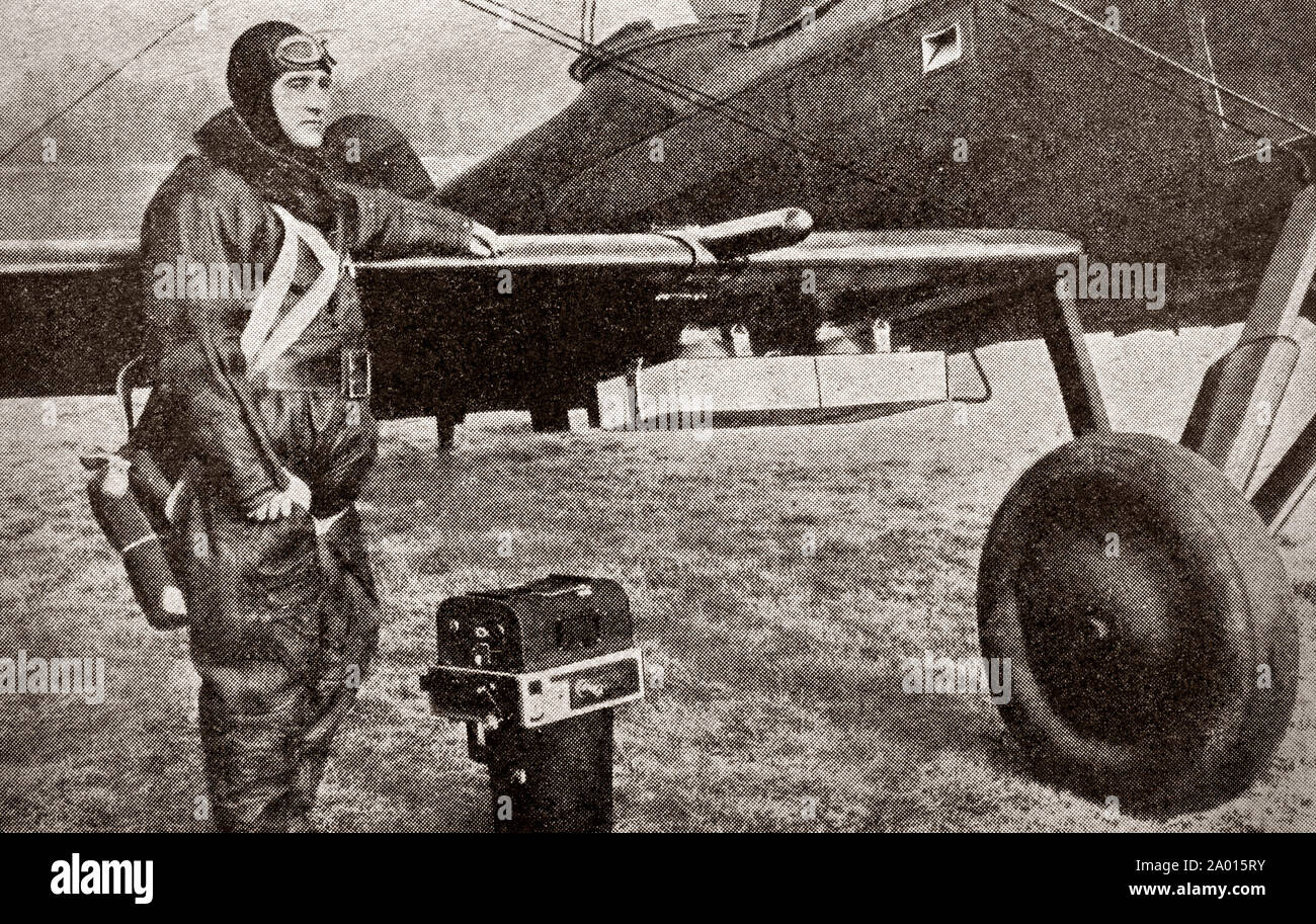 The latest engineering and technology from the 1930s. The 1930s pioneered the science of photogrammetry (mapping from aerial photographs), with the Ordnance Survey being an enthusiastic user. The photograph illustrates the Pilot, biplane and flashlight camera, used for mapping and surveys. The flashlight mechanism can be seen under the wing. Stock Photo