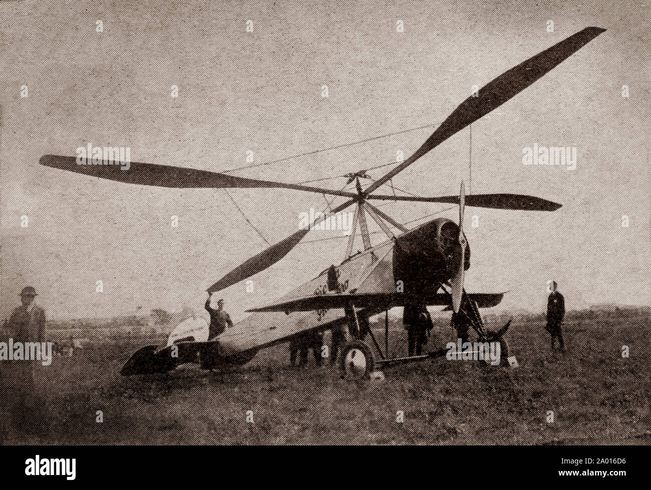 The latest engineering and technology from the 1930s: an autogyro, also known as a gyroplane or gyrocopter, is a type of rotorcraft that uses an unpowered rotor in free autorotation to develop lift. Forward thrust is provided independently, by an engine-driven propeller. While similar to a helicopter rotor in appearance, the autogyro's rotor must have air flowing across the rotor disc to generate rotation, and the air flows upwards through the rotor disc rather than down. Stock Photo