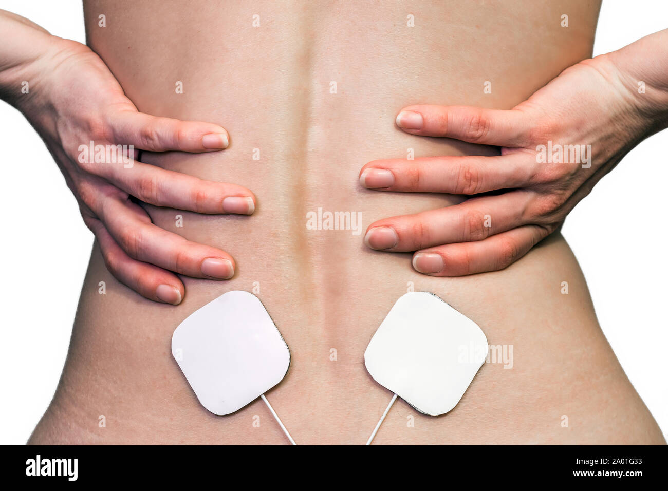 Electrotherapy for the treatment of pain in the lumbar region Stock Photo