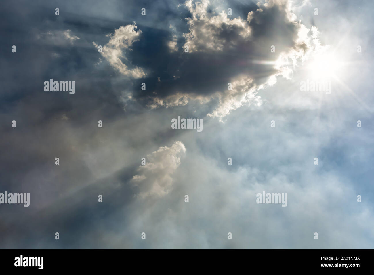 Sunshine clouded by clouds and smog Stock Photo