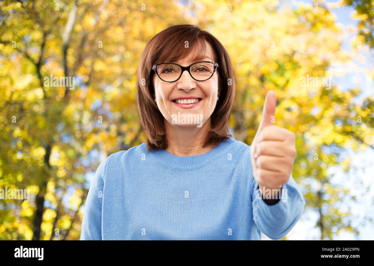 Mature woman thumbs up hi-res stock photography and images - Alamy