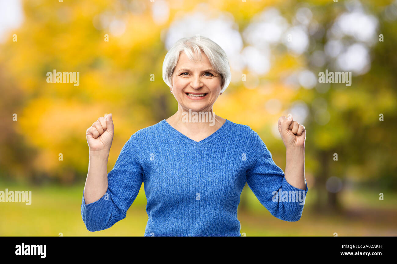 Old woman celebrating hi-res stock photography and images - Alamy