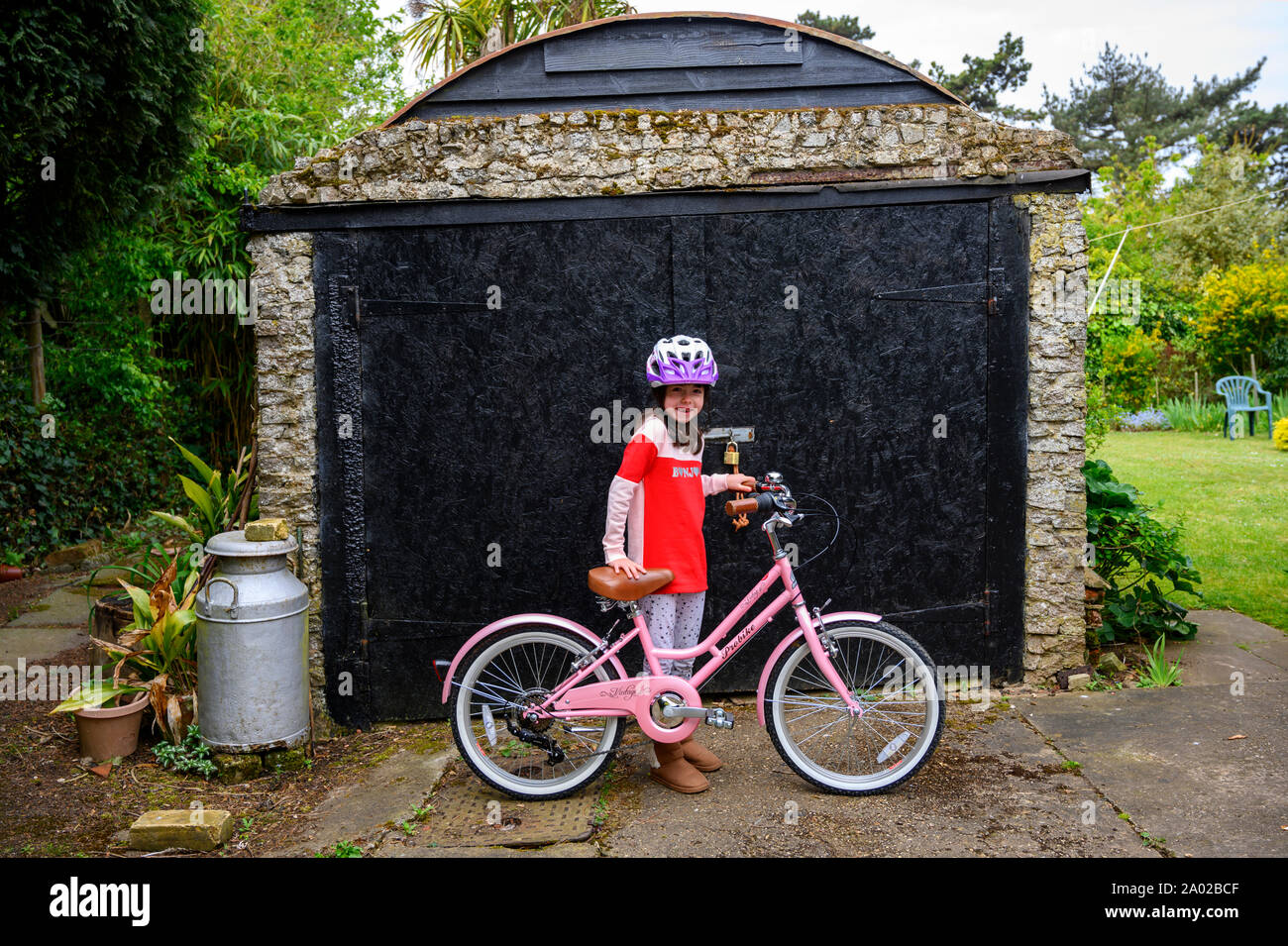 Child with new bicycle Stock Photo