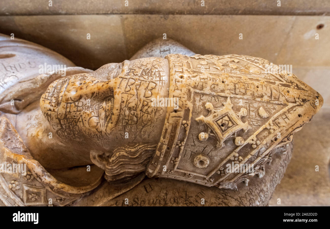 Ralph of Shrewsbury tomb 1329-1363 in Wells Cathedral Somerset UK, showing the copious  ancient graffiti inscribed on the alabaster stonework, Stock Photo