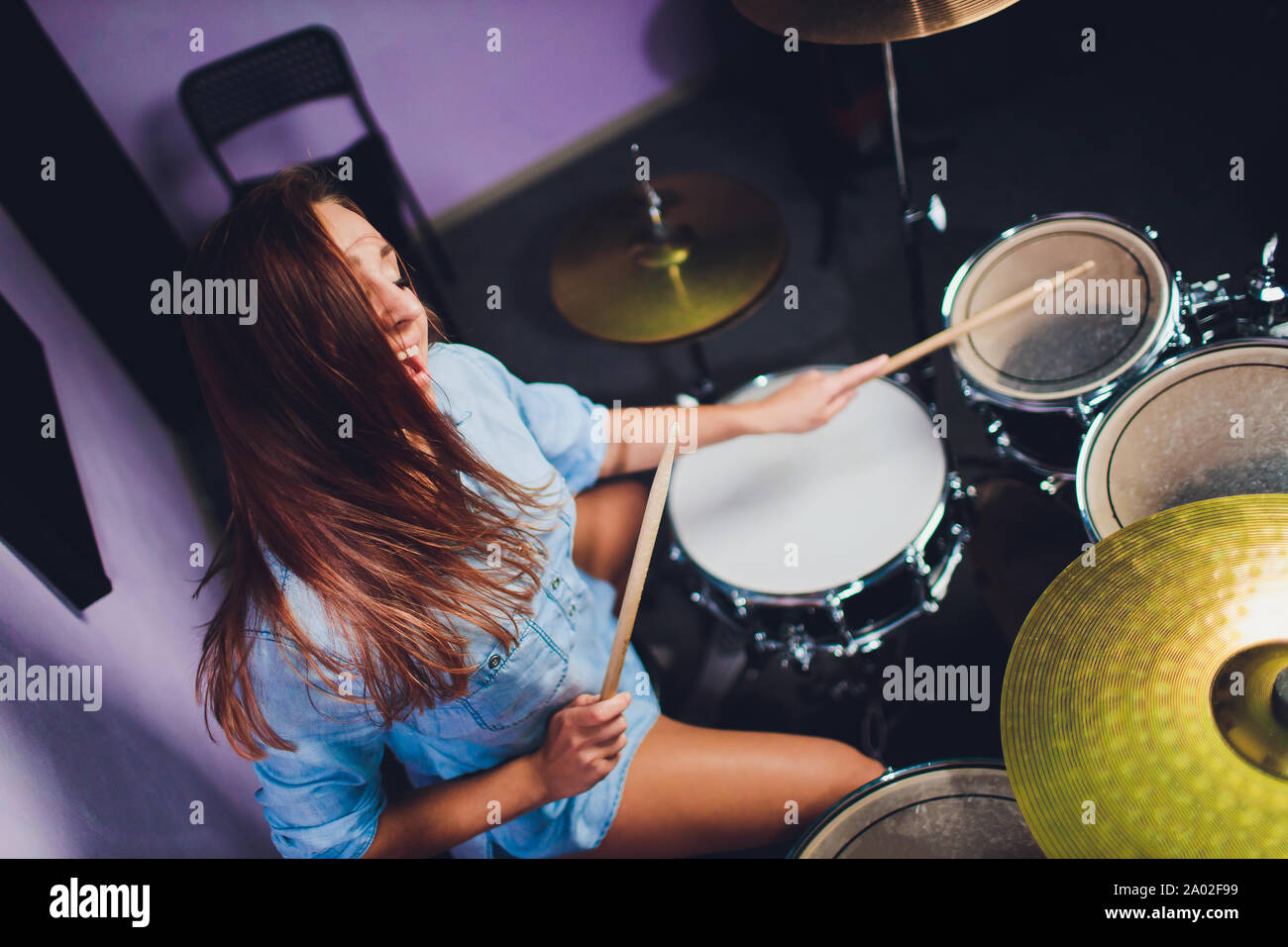 Asian Girl Playing Drum High Resolution Stock Photography and Images