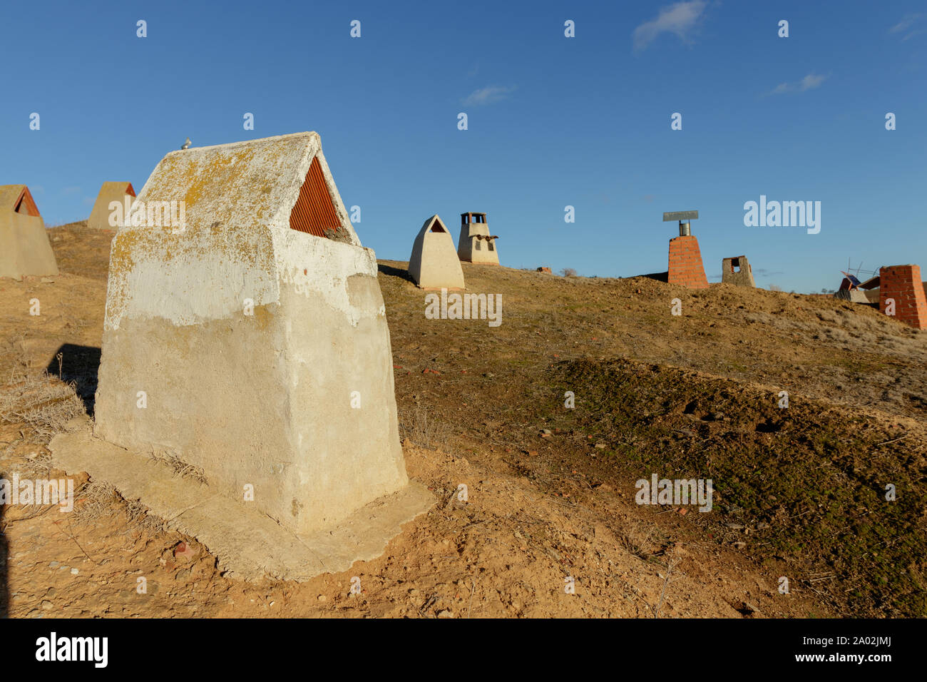 Subterranean storage air vents mounds in Rural Spain Stock Photo