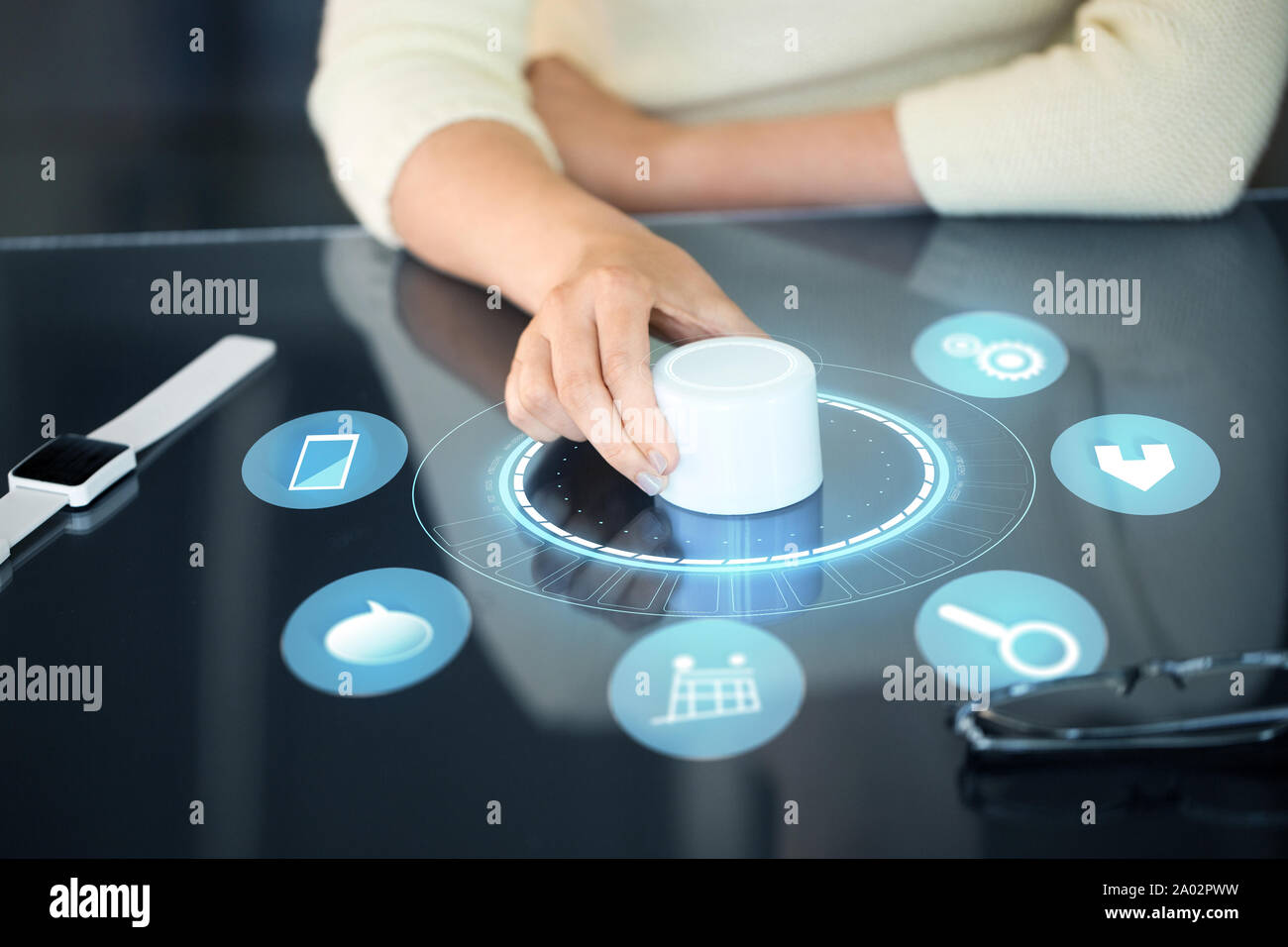 woman with control knob on interactive panel Stock Photo - Alamy