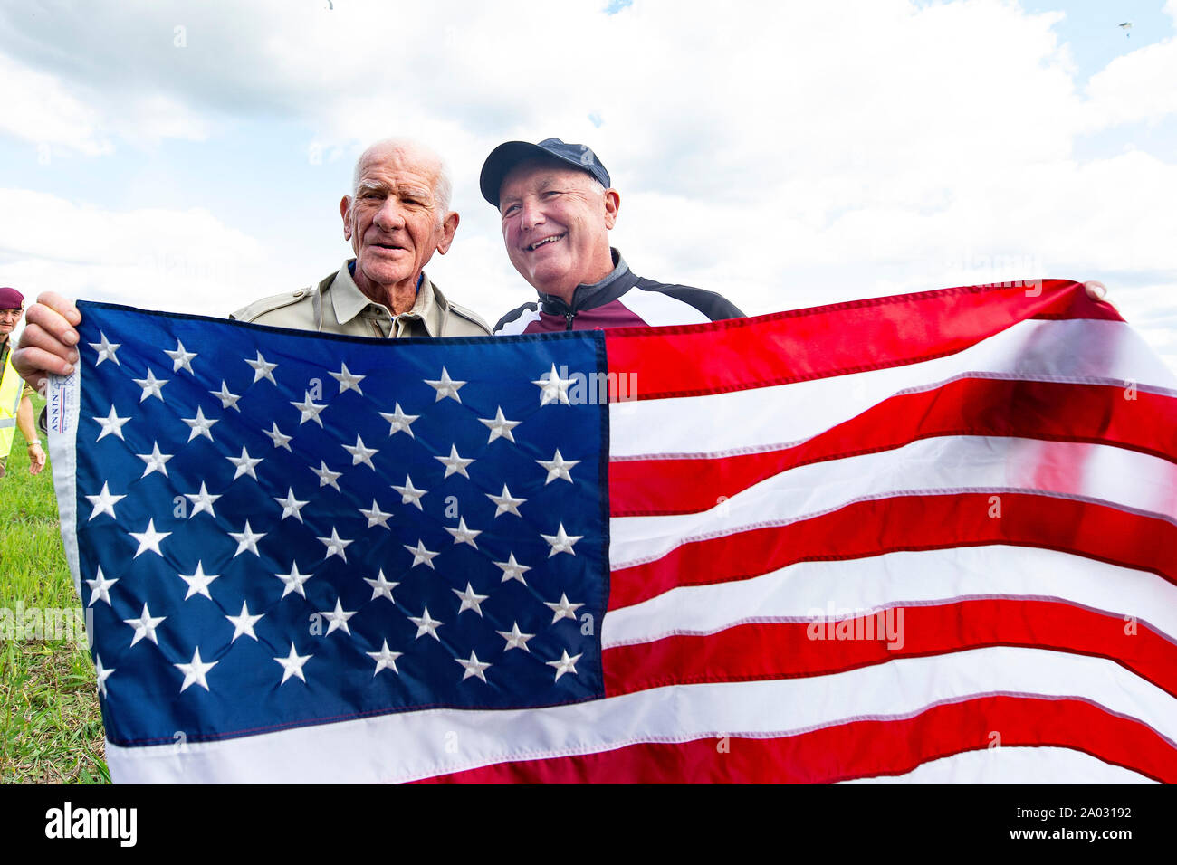 GROESBEEK 19-09-2019, dutchnews, parachute jump of mayor of Arnhem Ahmed Marcouch, US ambassador Pete Hoekstra and 89-old veteran Thomas Rice of the 501st Airborne division as part of 75th Airborne remembrance Stock Photo