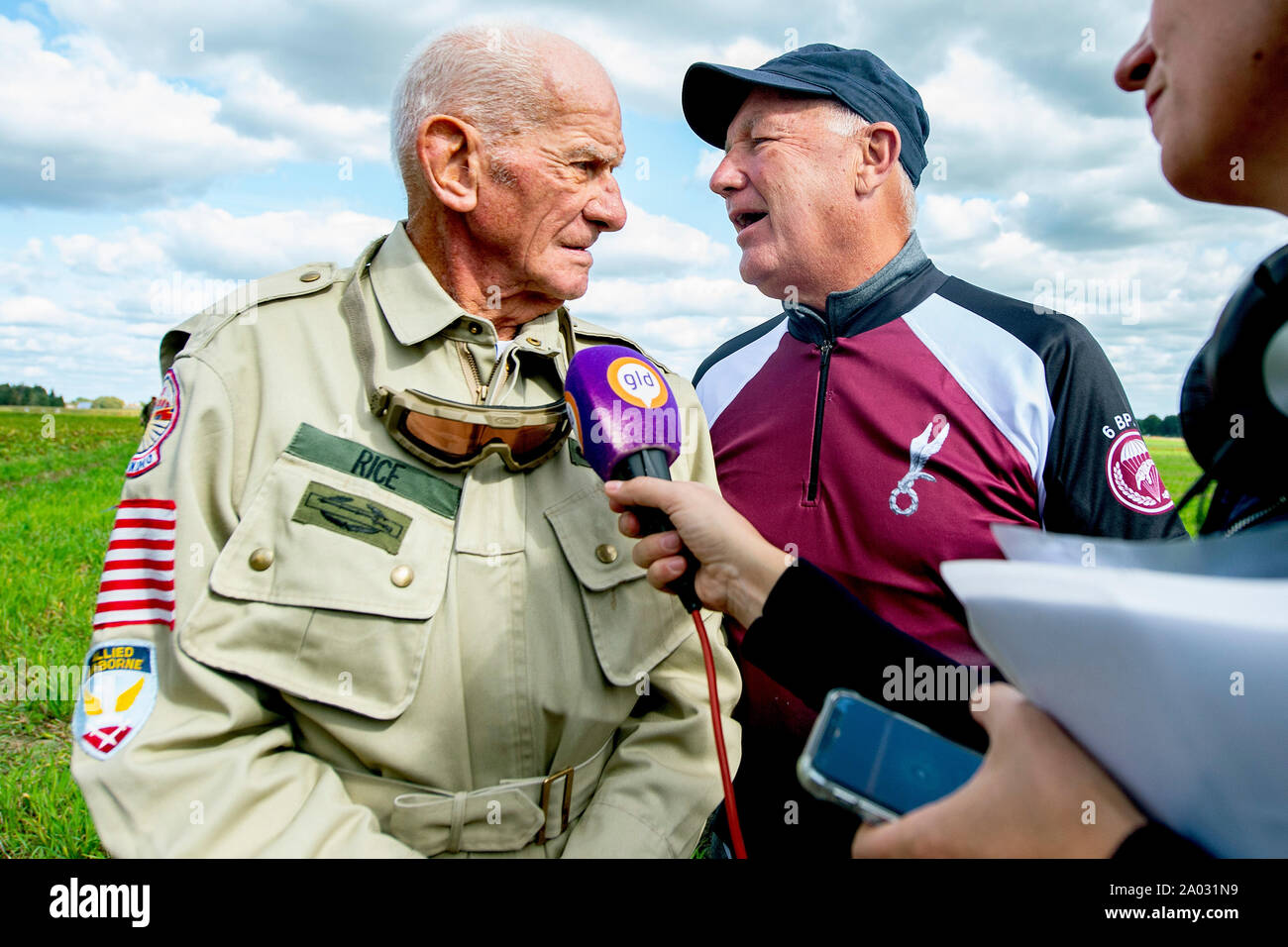 GROESBEEK 19-09-2019, dutchnews, parachute jump of mayor of Arnhem Ahmed Marcouch, US ambassador Pete Hoekstra and 89-old veteran Thomas Rice of the 501st Airborne division as part of 75th Airborne remembrance Stock Photo