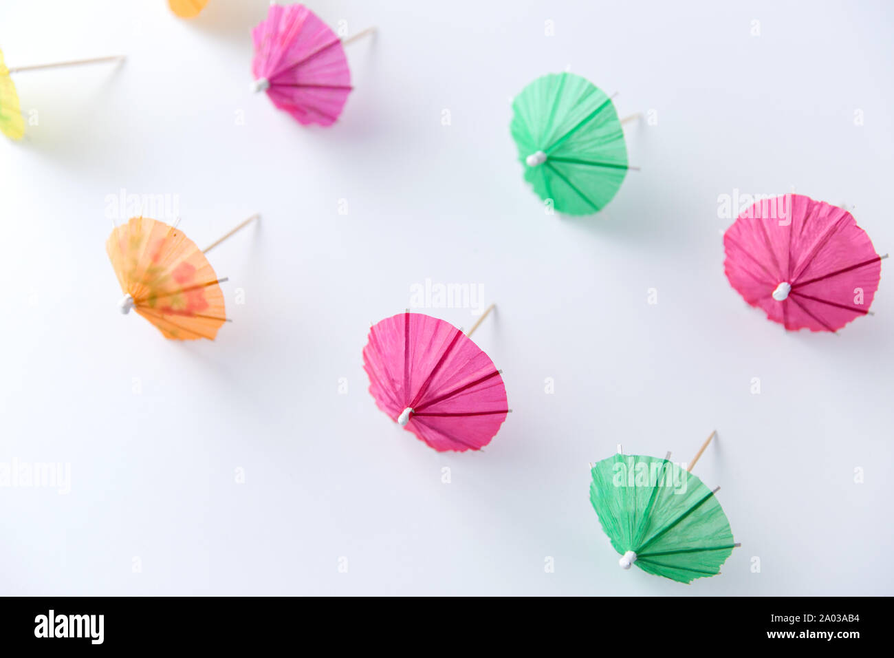 cocktail umbrellas on white background Stock Photo