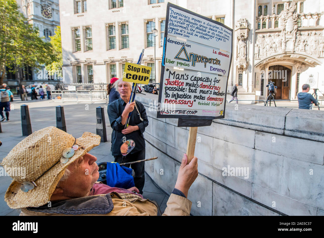 London, UK. 19th Sep 2019. Stop the coup, pro remain protestors outside - The Supreme Court, in Parliament Square, decides on Prime Minister Boris Johnson's decision to suspend parliament. Credit: Guy Bell/Alamy Live News Stock Photo