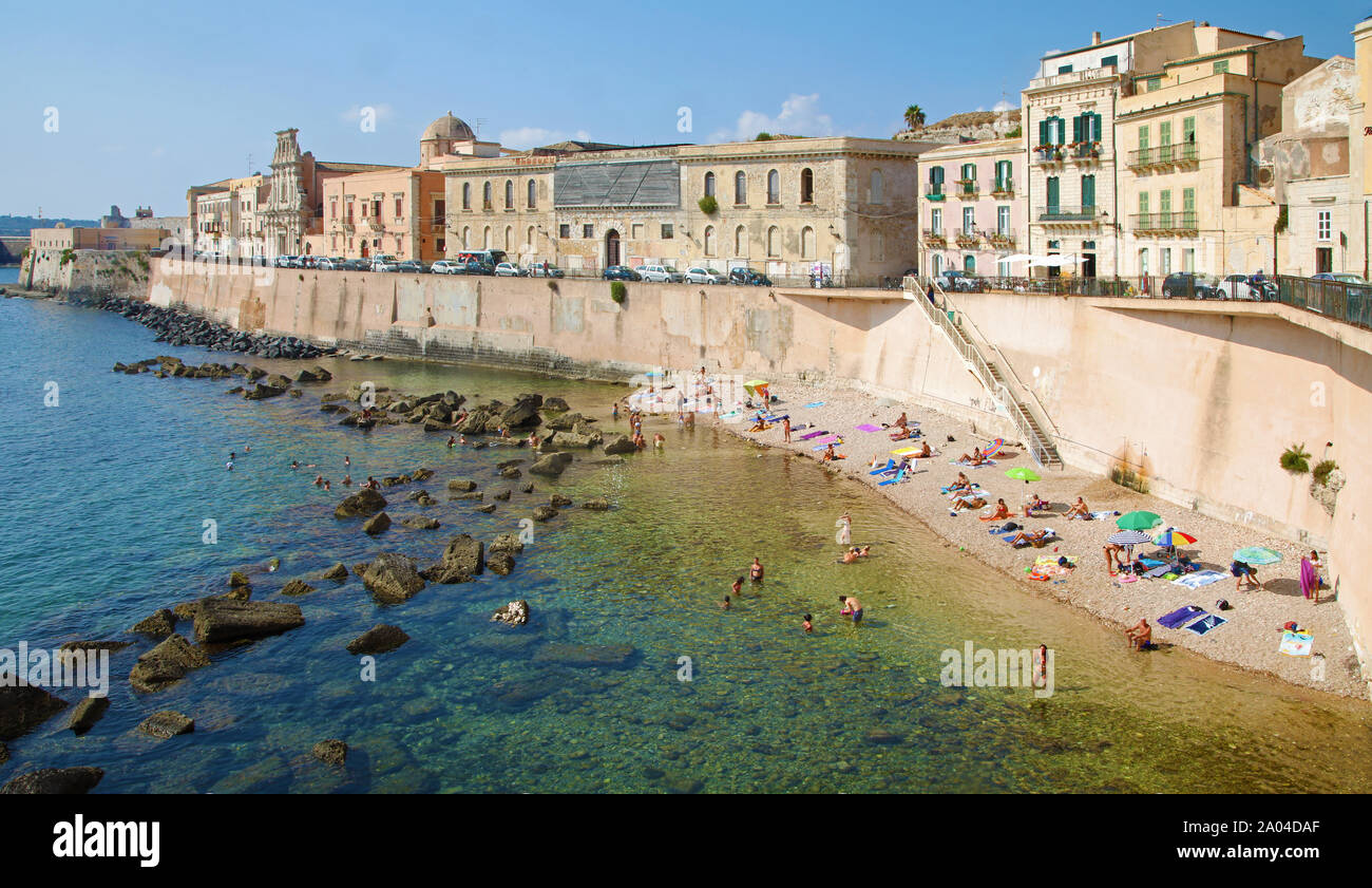 Small beach in ancient Syracuse, Sicily Stock Photo