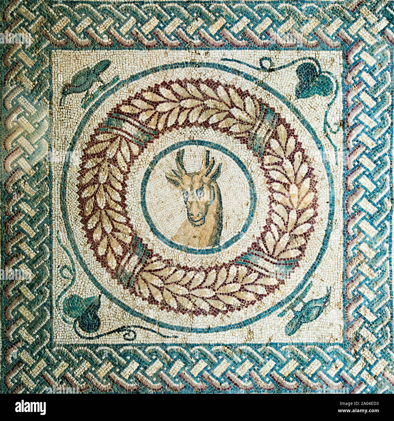 Antelope head in ancient roman mosaic, Sicily Stock Photo