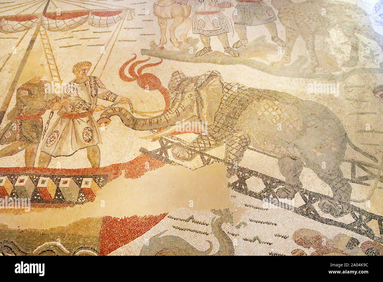 Elephant getting on a boat, ancient mosaic of Piazza Armerina, Sicily Stock Photo