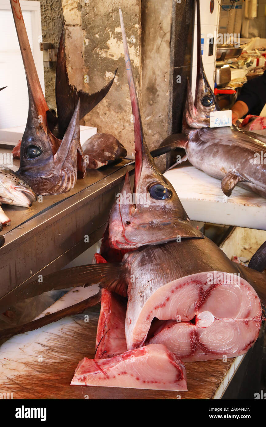 Swordfish on sale in a sicilian fish market Stock Photo Alamy