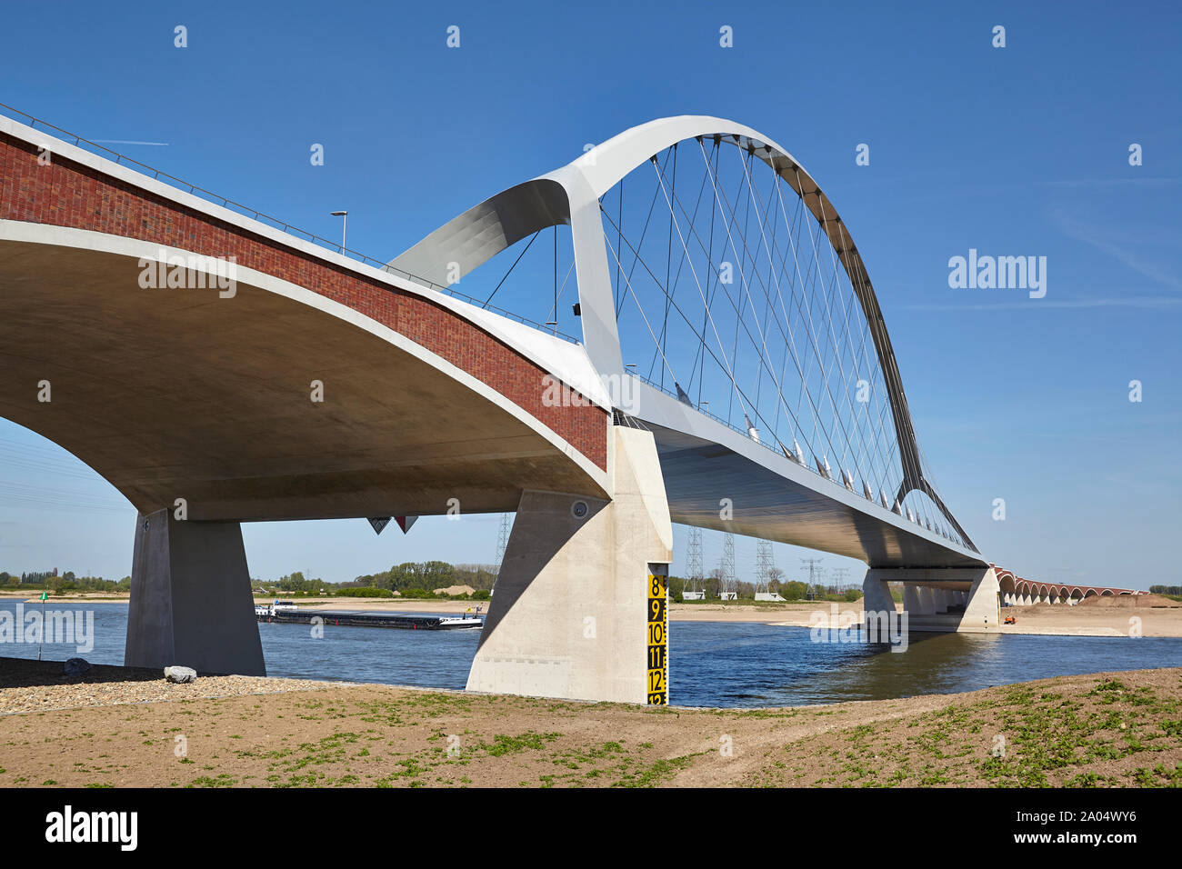 Bowstring arched bridge called De Oversteek which spans the river Waal at Nijmegen Stock Photo