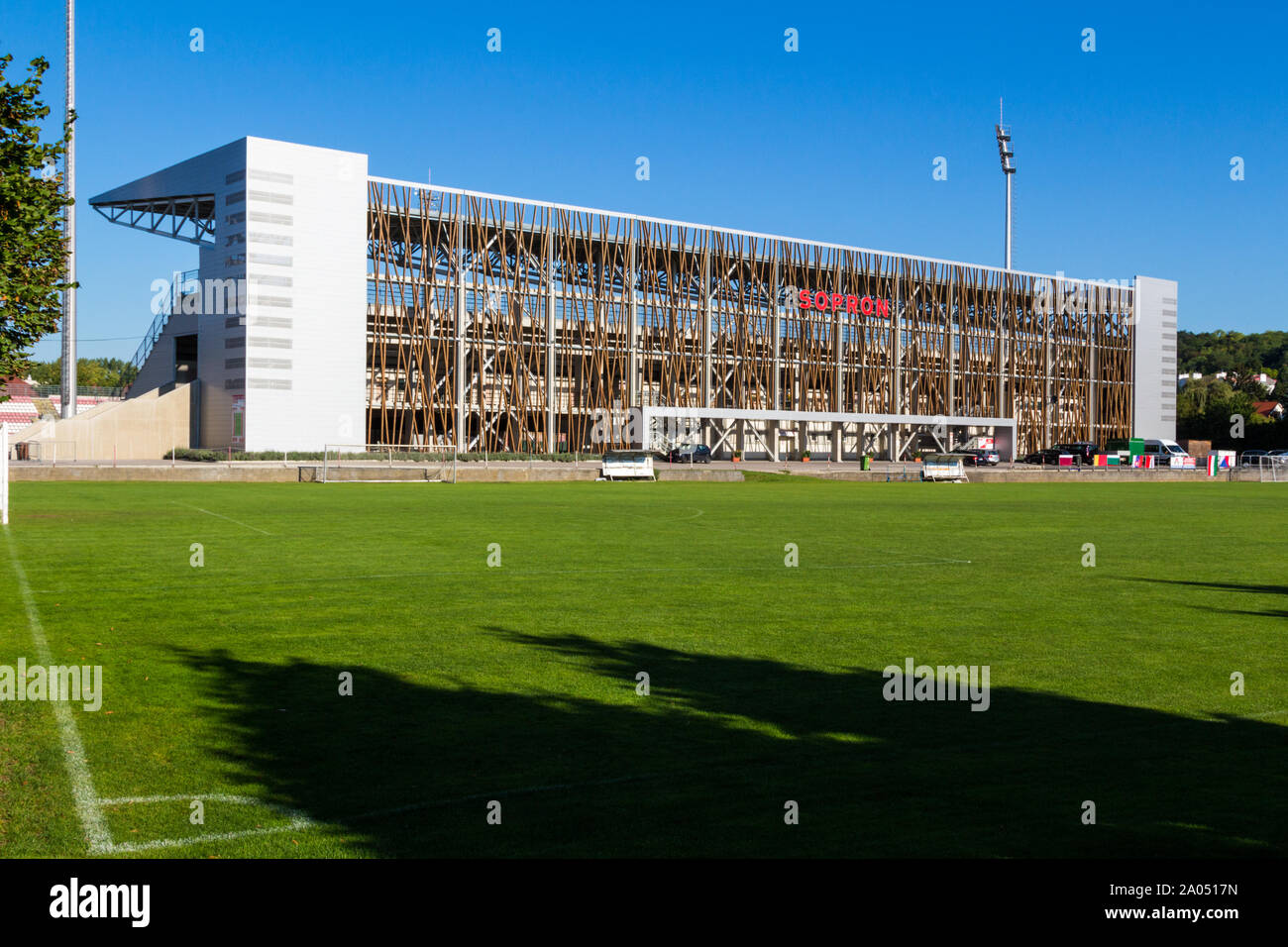 Local Stadium exterior VIP entrance and football field, Sopron, Hungary Stock Photo