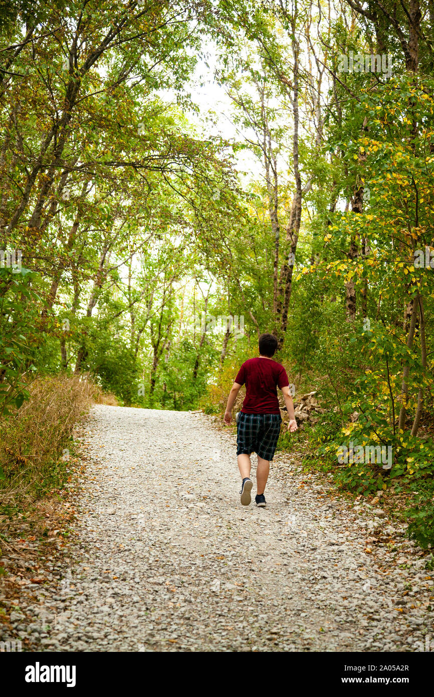 Beautiful young woman traveler walks hi-res stock photography and ...