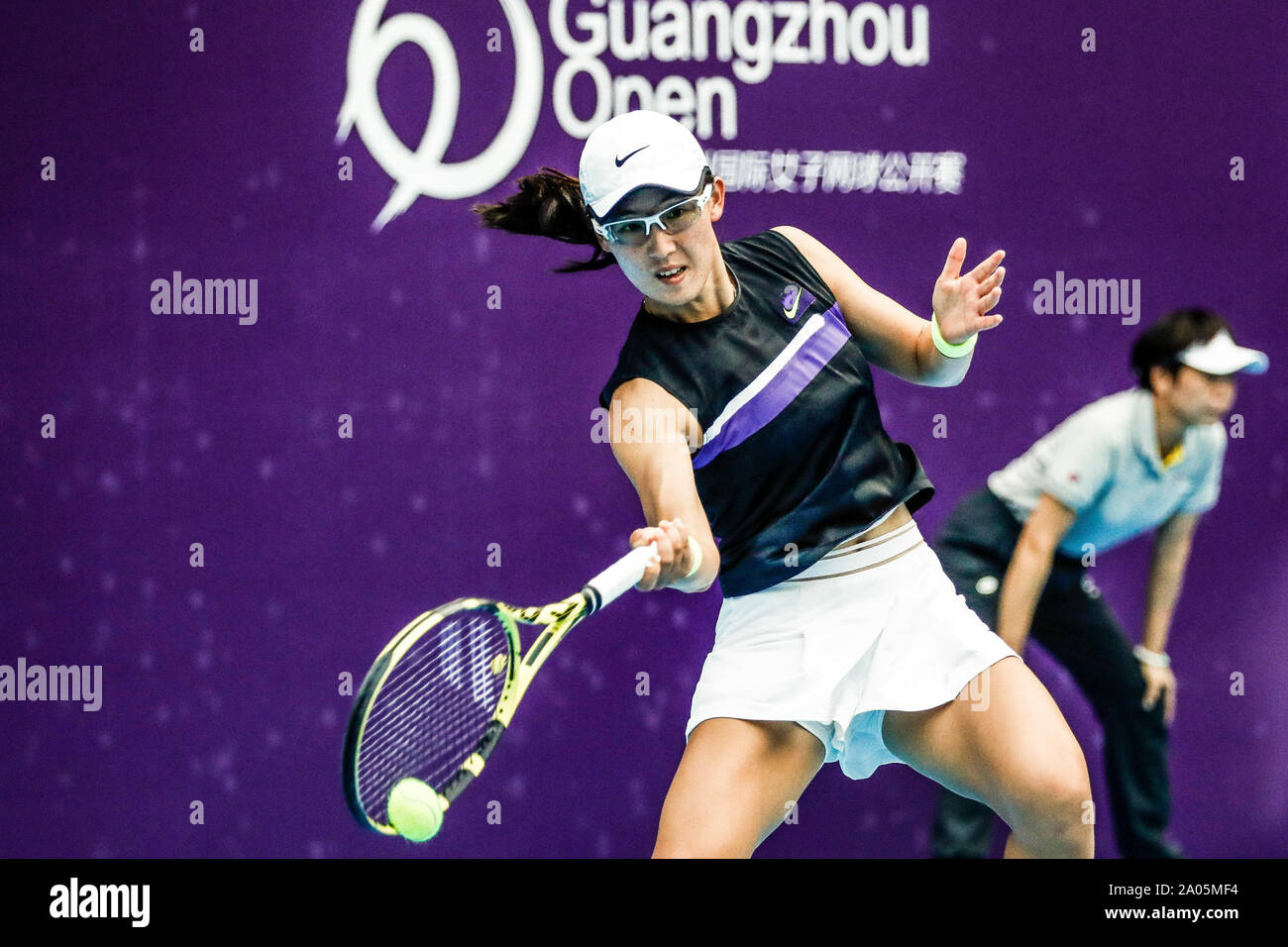 Chinese professional tennis player Zheng Saisai plays against Italian  professional tennis player Jasmine Paolini at the first round of WTA  Guangzhou Open 2019 in Guangzhou city, south China's Guangdong province, 18  September