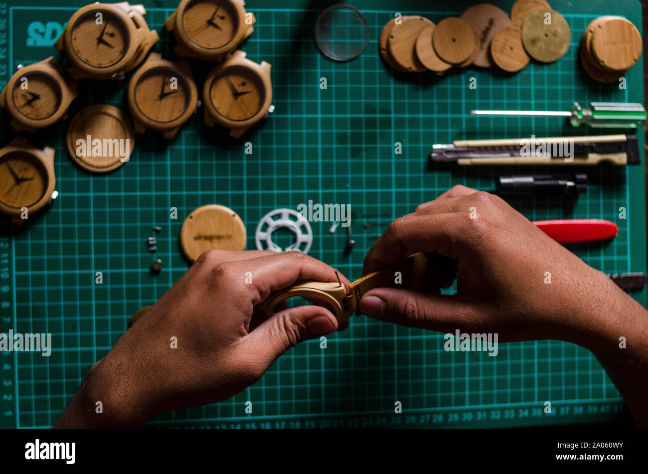 Bandung, Indonesia. 19th Sep, 2019. A worker makes a handmade bamboo watch in Bandung, West Java, Indonesia, Sept. 19, 2019. Credit: Septianjar/Xinhua Stock Photo