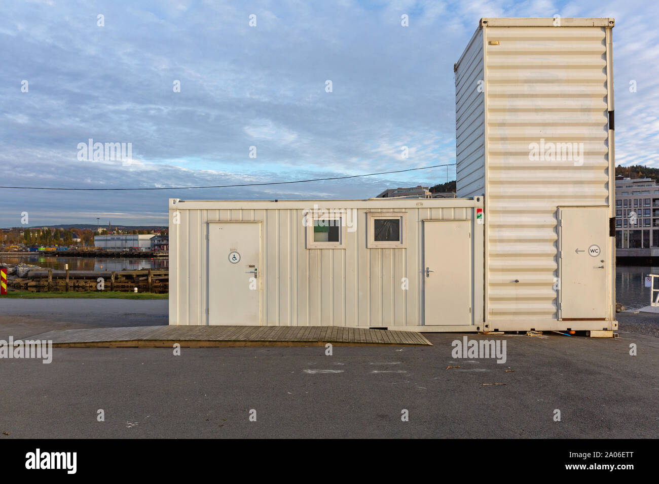 Temporary Public Toilet in Converted Cargo Container Stock Photo