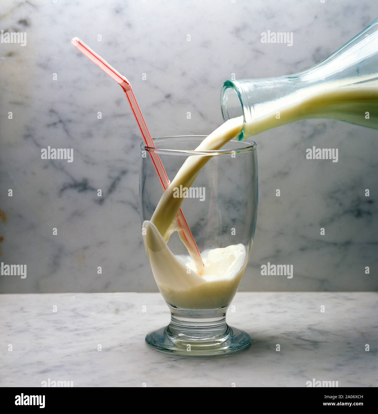 Glass and jar of milk Stock Photo